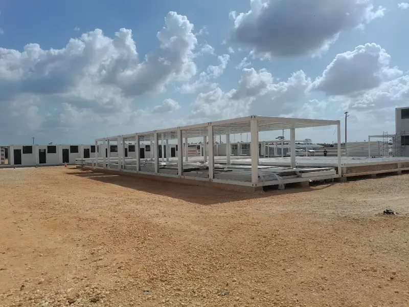 Insulated panel assembly for modular camp buildings