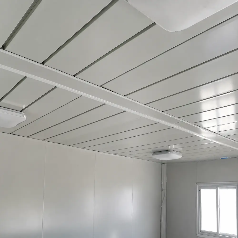 Roof panel build-up with insulation and foil layer